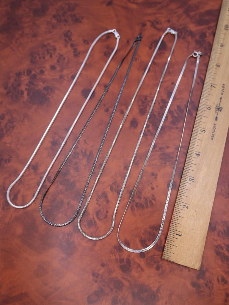 Four silver chains - 2