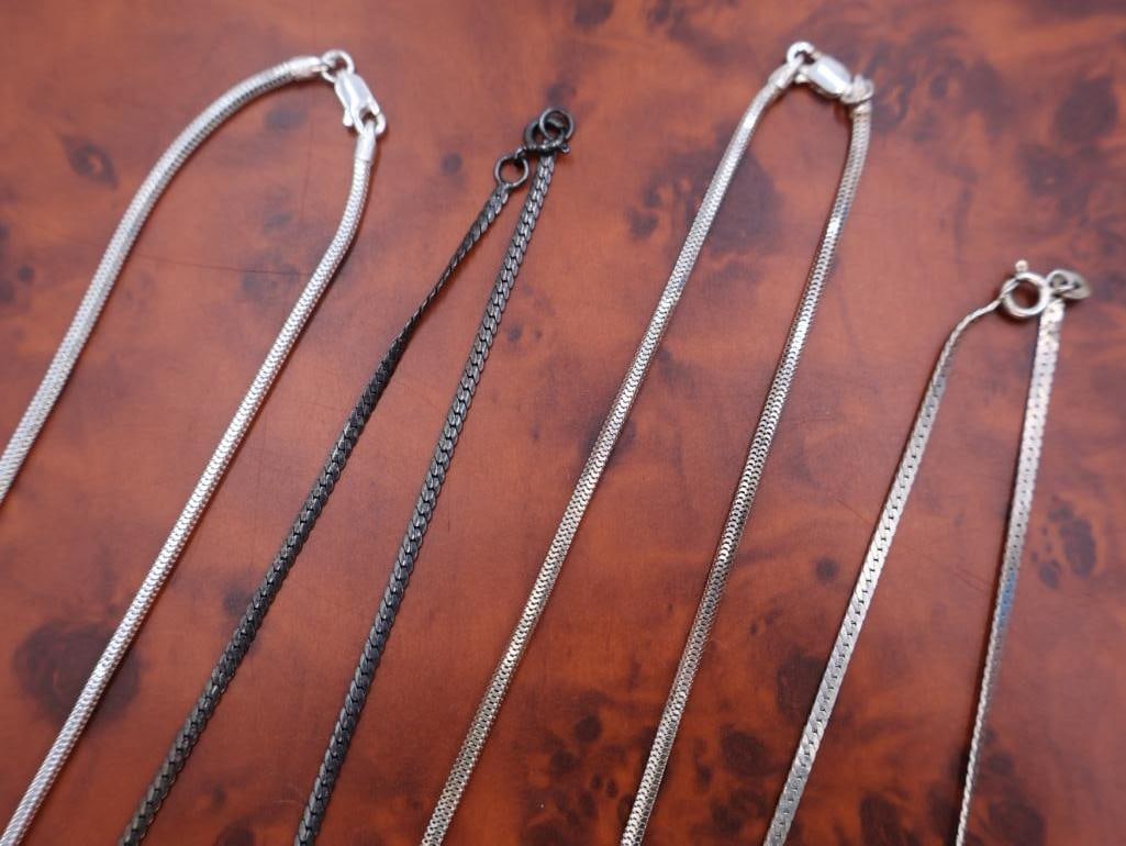 Four silver chains - 5