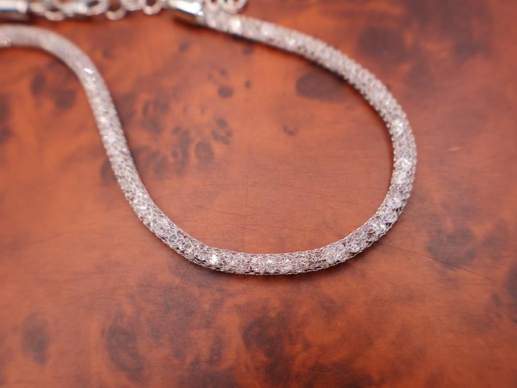 Collection of various silver-tone necklaces - 11