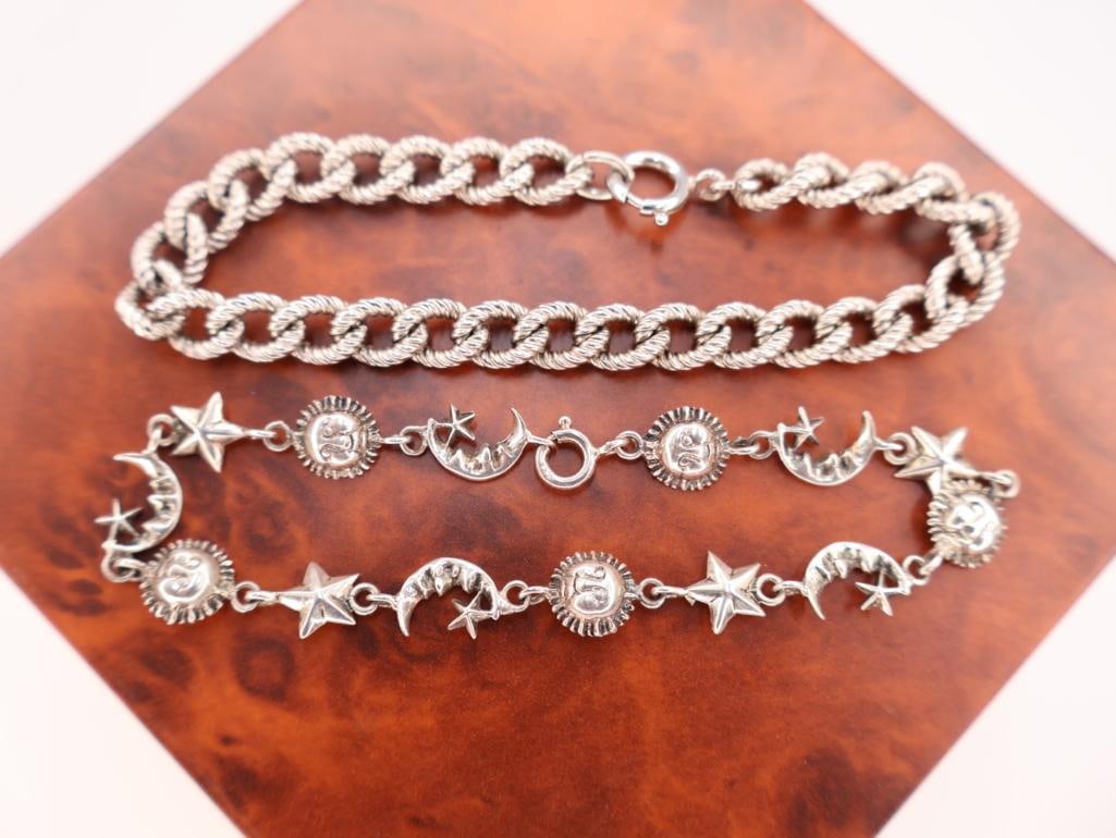 Two vintage sterling bracelets: Sterling silver sun, moon, and star celestial bracelet, shown alongside a silver curb chain bracelet. 