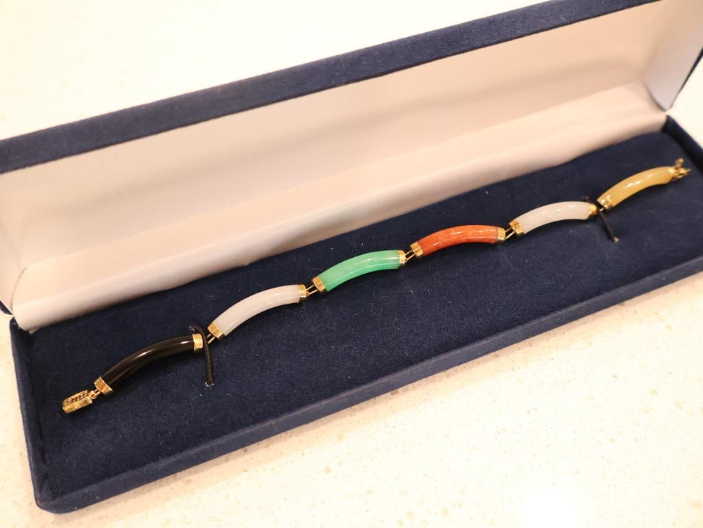 Vintage 14K Multi-Colored Jadeite Jade Link Bracelet: An elegant example of mid-to-late 20th-century Chinese export jewelry. The "14K 585" hallmark on the clasp confirms it is crafted from solid 14-karat gold. Click on the main photo to view more photos