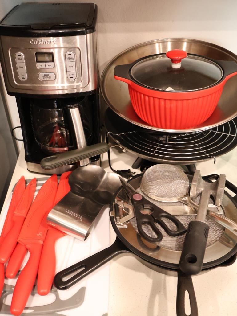 A mix of high-end appliances, durable cast iron, and essential culinary tools (1 of 10)
