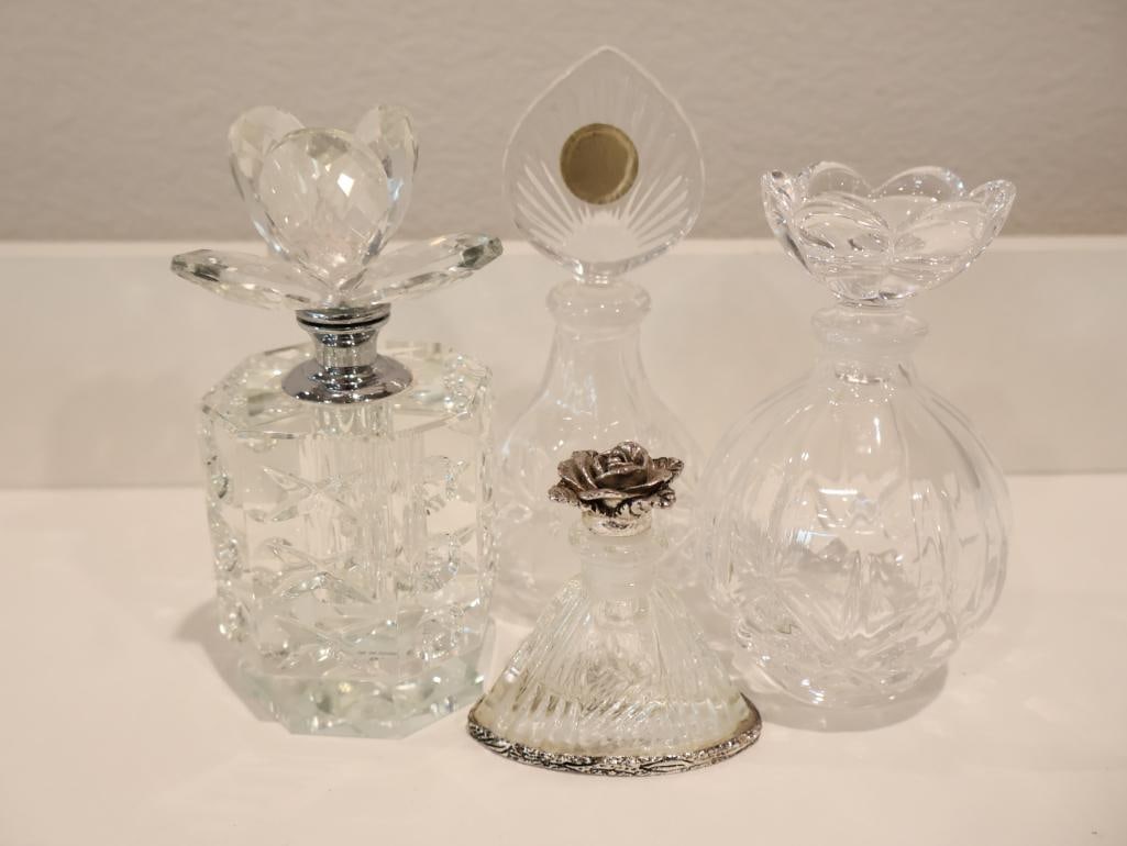 Curated collection of four vintage crystal and glass perfume bottles (1 of 11)