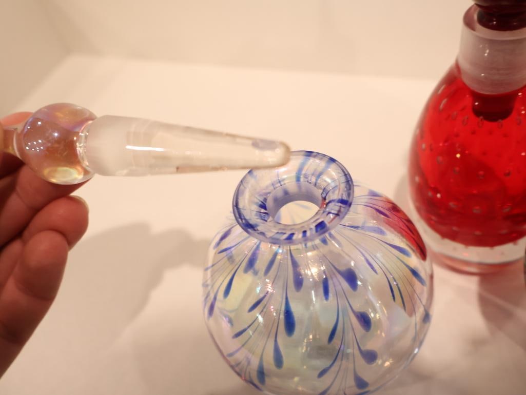 Curated collection of four vintage studio art glass perfume bottles - 3