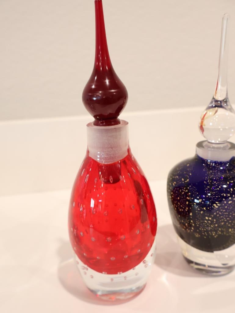 Curated collection of four vintage studio art glass perfume bottles - 5