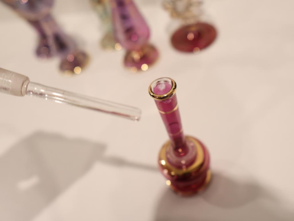 Exquisite collection of seven authentic hand-blown Egyptian glass perfume bottles - 12