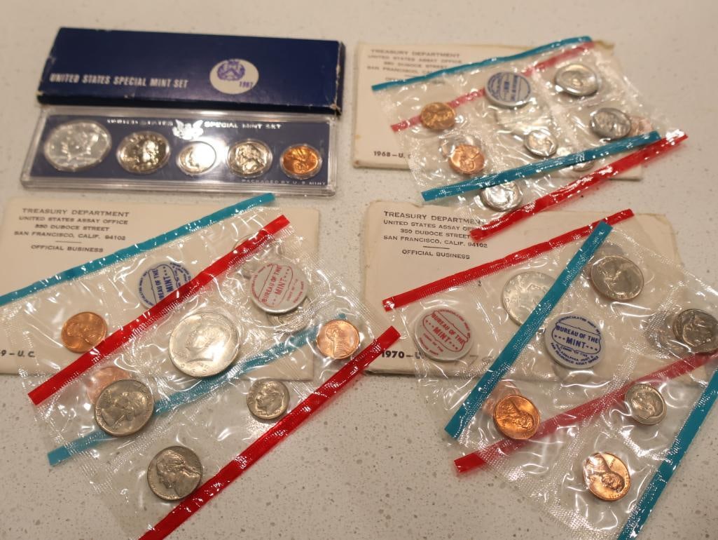 Collection of four United States Mint Uncirculated Coin Sets (1 of 9)