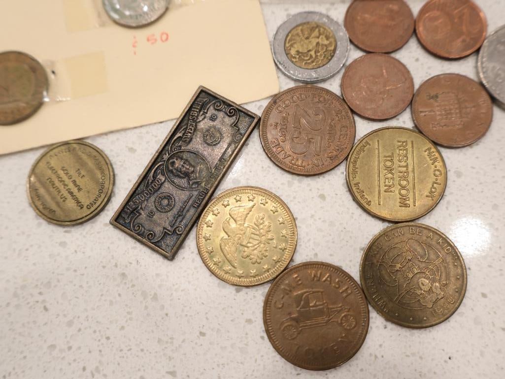 An eclectic collection of world coinage, exonumia, and a unique numismatic-themed clock - 7