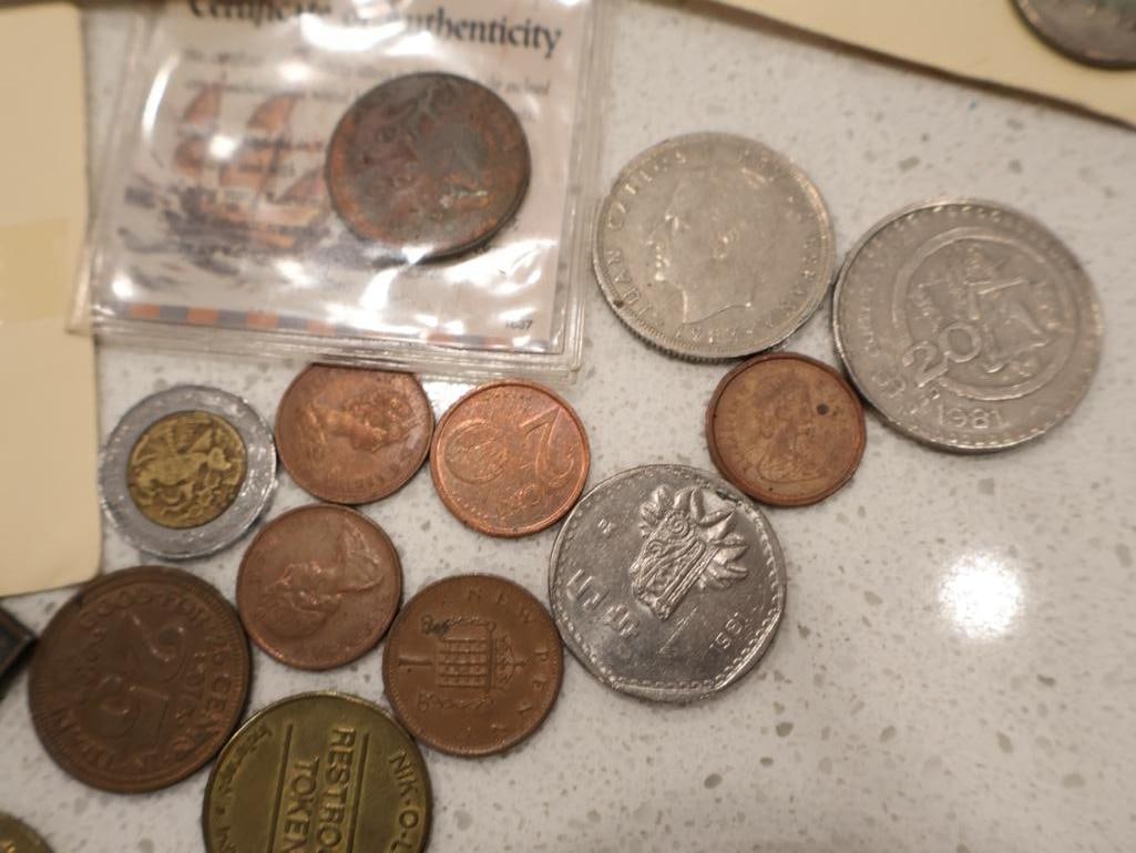 An eclectic collection of world coinage, exonumia, and a unique numismatic-themed clock - 8