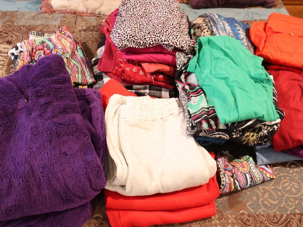 Collection of Ladies Folded Clothing: Click on the main photo to view more photos of this lot. We ship and offer local in person pickups.