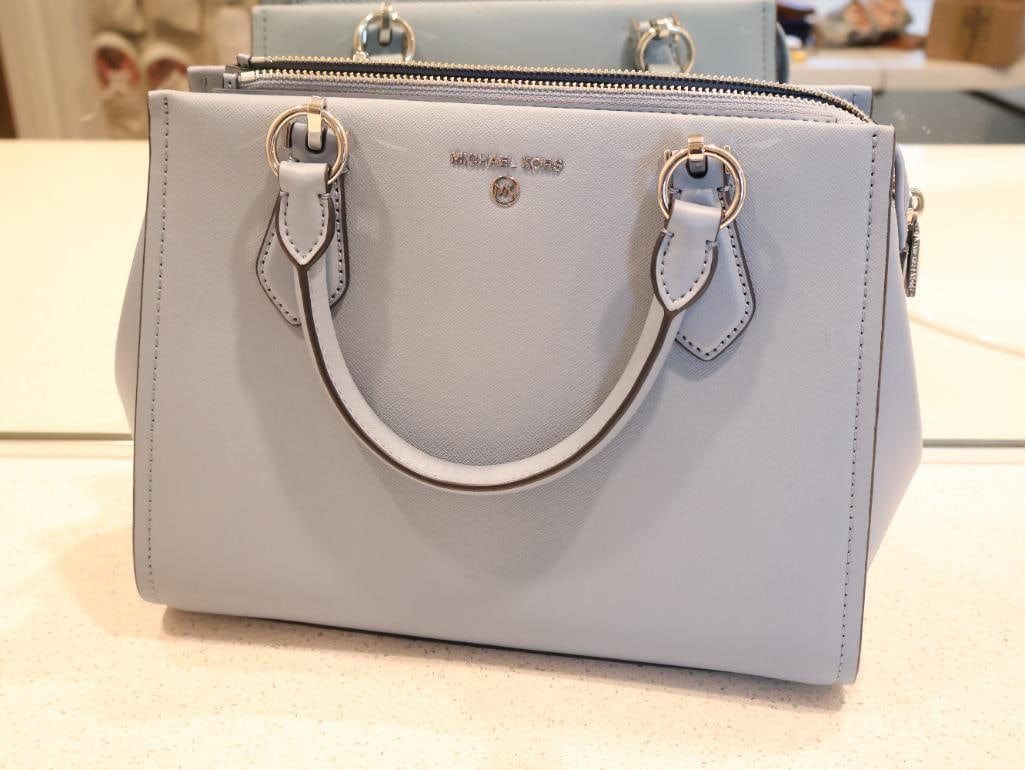 Light Blue Michael Kors Marilyn Medium Satchel: Has Original Price Tag, $178.80. Light blue coloring, new condition with stuffing and tags still attached 