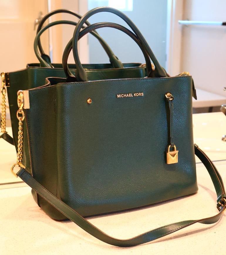 Dark Green Michael Kors Arielle Leather Tote: Lovely dark green cross body tote style purse with multiple internal pockets. In very good condition. 