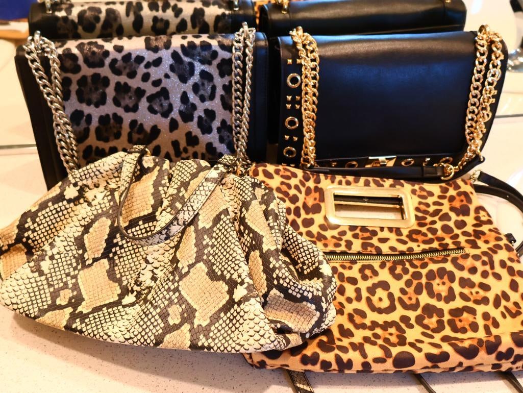 Collection of Four INC Animal Print and Statement Purses: Four purses all by INC brand featuring animal prints like snake and leopard, and black studded with gold accent shoulder bag 