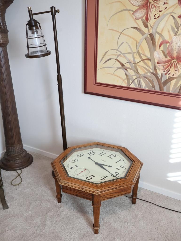 Howard Miller Octagon Table Clock and Averill Park Industrial Floor Lamp: Click on the main photo to view more photos of this lot. We ship and offer local in person pickups.
