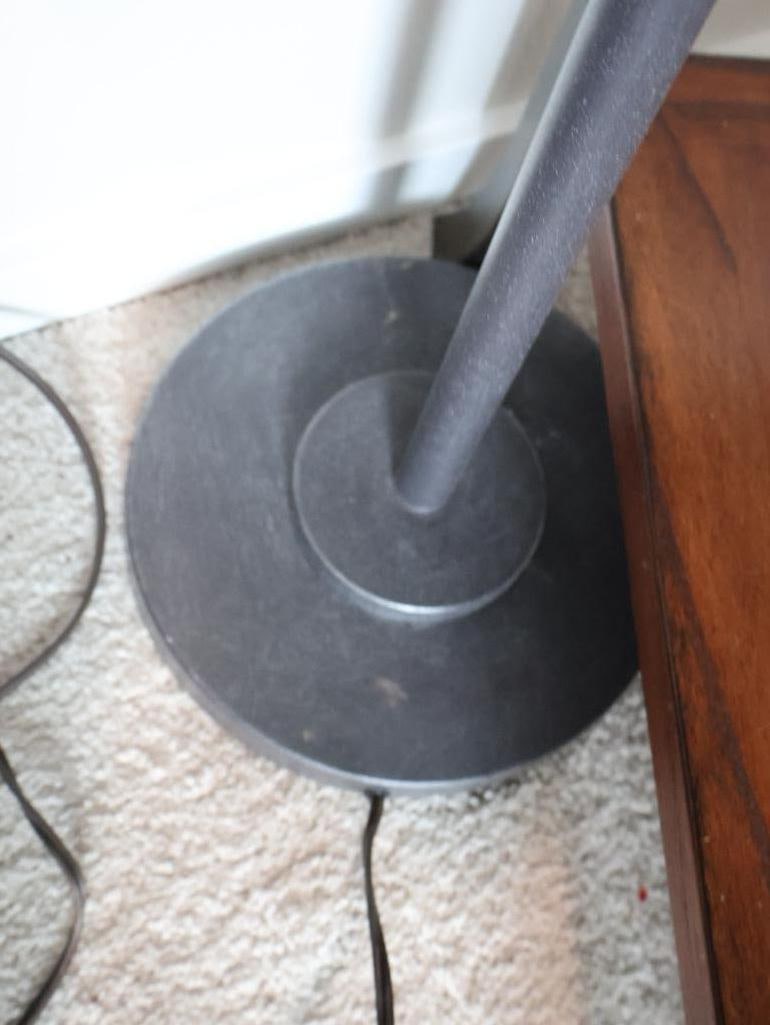 Industrial-style lighting and a traditional chairside table - 4