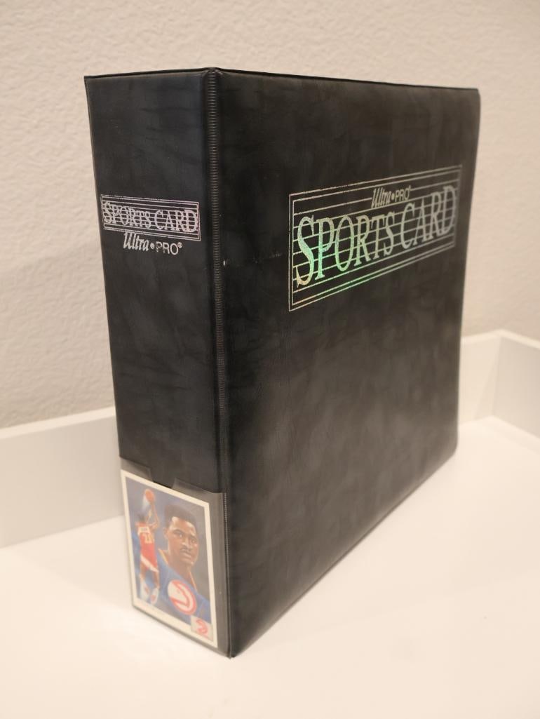 Ultra PRO Sports Card Album with cards: 1992-93 Fleer Ultra #328, 1992-93 Upper Deck #1, Anthony Peeler Rookie Cards and more. 