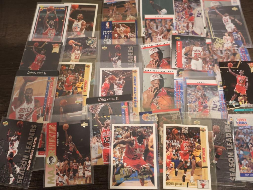 Collection of various Michael Jordan basketball trading cards (1 of 12)