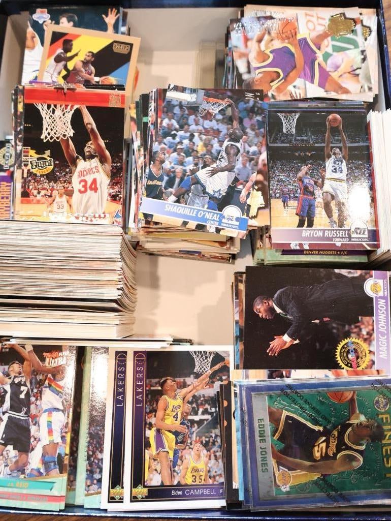 Box Full of Collectible Basketball Cards: Includes many NBA Hoops cards, Fleer, Upper Deck, Topps, and more. Reggie Jordan Rookie card, Magic Johnson, Shaquille O'Neal Magic, Bryon Russell Rookie card and more