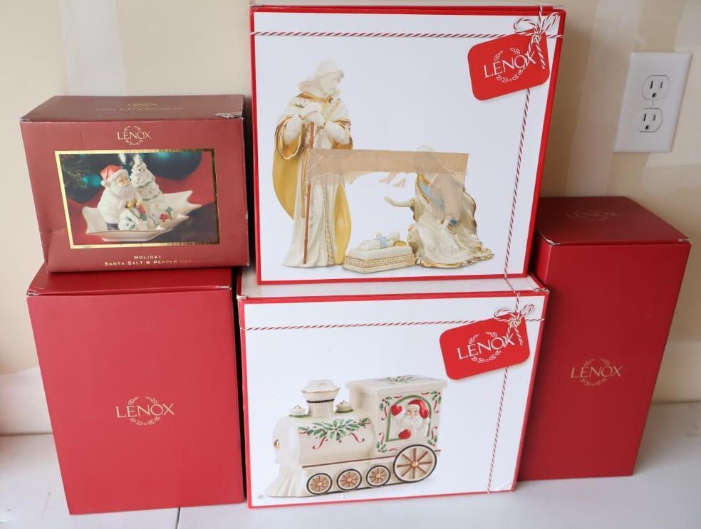 Five Boxed Lenox Decor: First Blessing Nativity Holy Family 3 piece set, Santa Train Cookie Jar, 3 piece Santa and Tree Salt and Pepper shaker set, First Blessing Nativity Angel of Hope, and Merry and Magic Sledding Snowman
