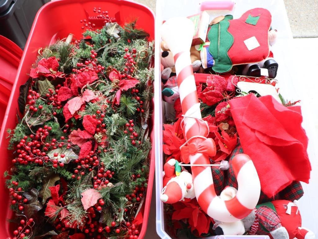 Two Large Bins of Christmas Decor and Garland: Includes newer candy cane blow mold, candles, santas, and more candy cane yard decor 