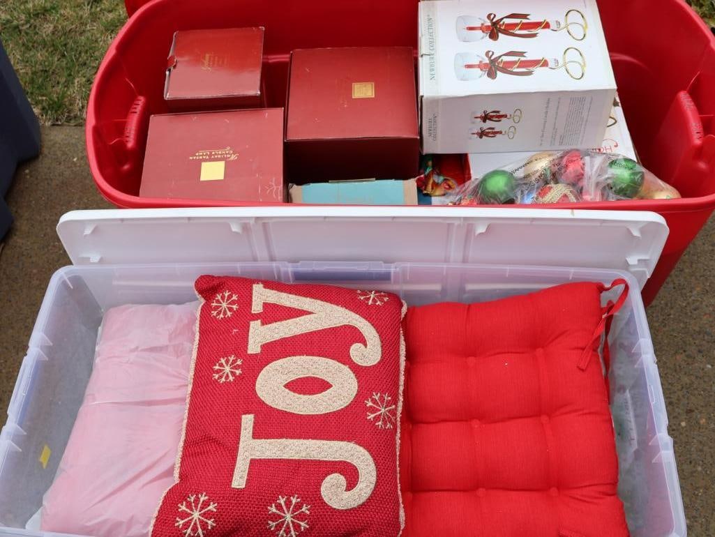 Two Large Bins with Holiday Pillows and Decor: includes two Lenox Holiday Tartan Candle Lamps, Towle box of ornaments, seat cushions, pillows, and two pillow new with tags