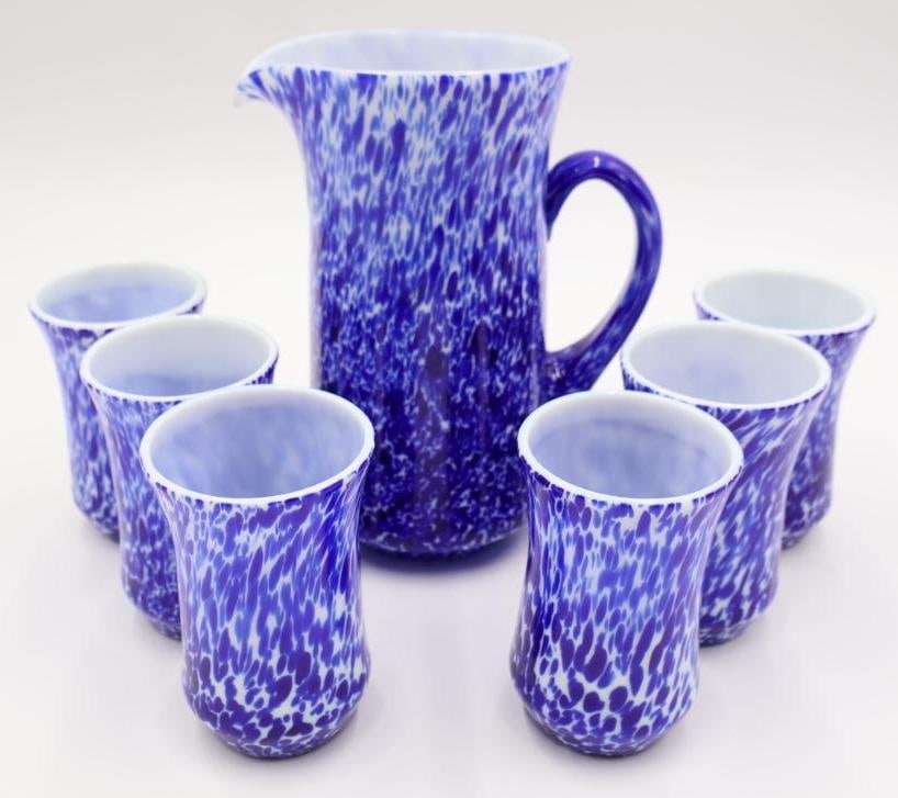 1987 Gibson Glass Pitcher and Glassware Set: Cobalt blue speckle marble pitcher with six matching glassware, stamped 'Gibson 1987' on bottom