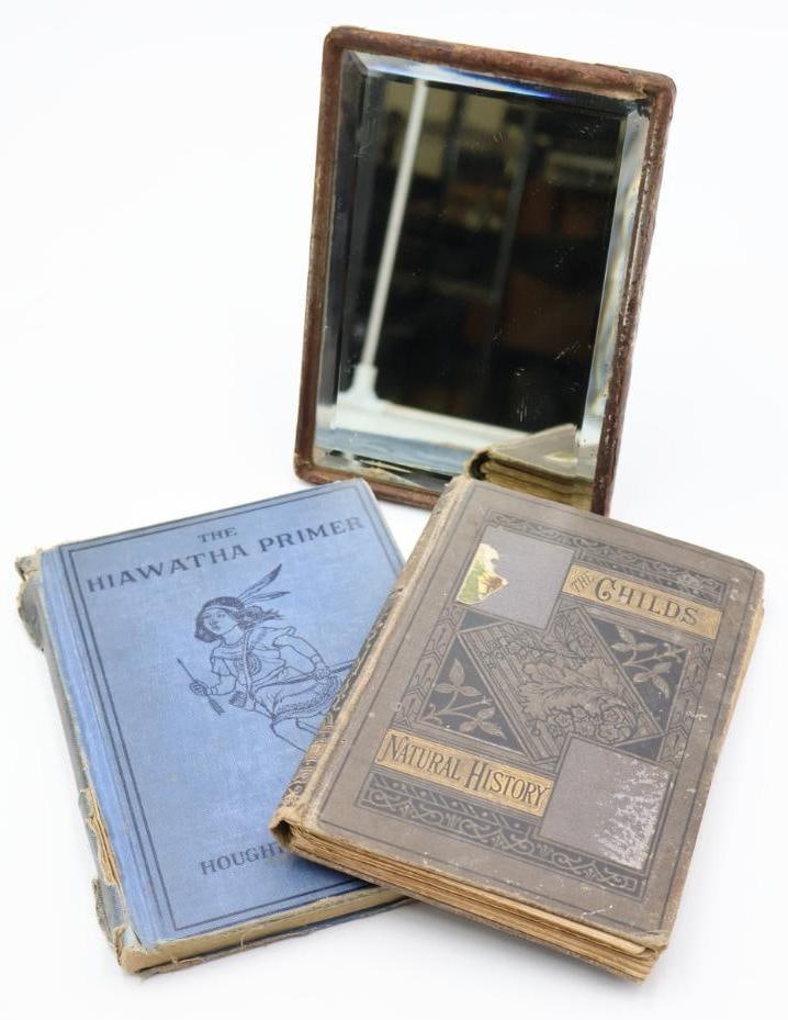 Antique Mirror and Children's Books: Antique standing picture frame style beveled mirror, 'The Child's Natural History' by A.L. Bond, and The Hiawatha Primer by Florence Holbrook