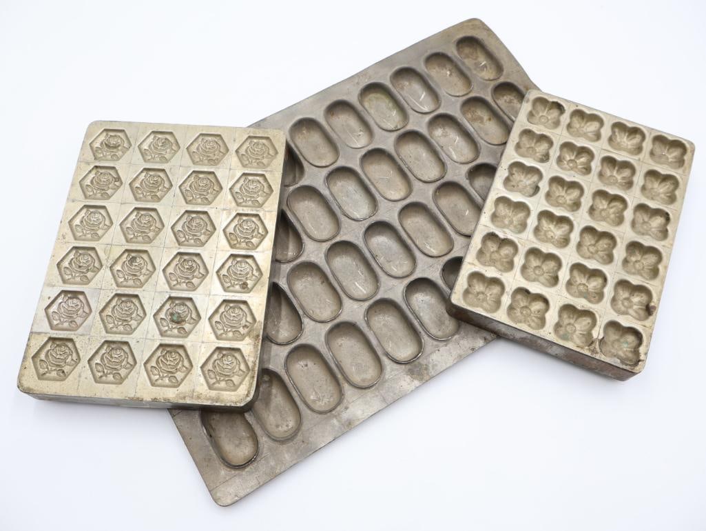 Three Vintage Chocolate/Dessert Mold Trays: Two smaller trays for making small 'button' chocolate accents one marked 1942 and Thomas Mills and Bro, and larger oblong shaped mold