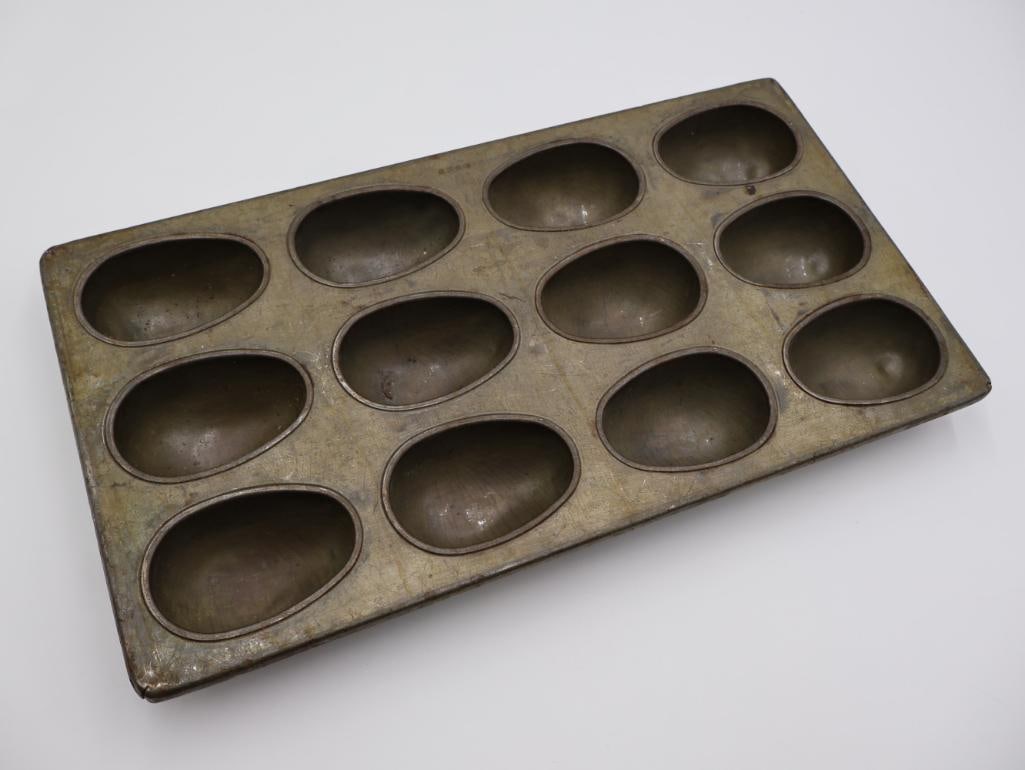 Vintage Large Rare Ekco Brand Easter Egg Mold Pan: Just under 2" deep, this pan is perfect for making hollow chocolate Easter Eggs or other desserts 