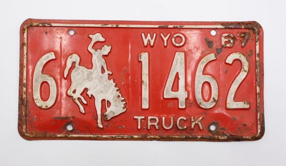 Vintage Wyoming 1967 Red Truck License Plate: Featuring iconic bucking bronco red plate with great patina 