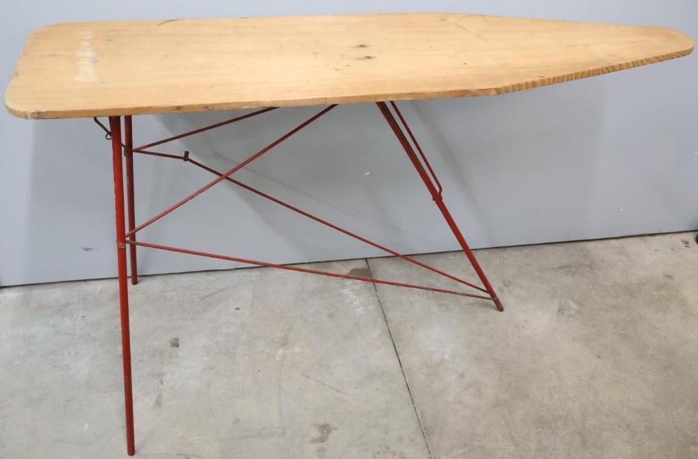 Vintage Wood Ironing Board with Red Metal Stand: Folding vintage wood ironing board with thin red stand for striking contrast, great as a side table