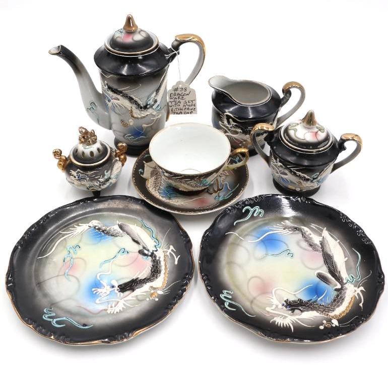 Vintage Dragonware Tea Set with Lithophane Tea Cup: Tea cup bottom when held up to light shows image of seated nude lady, set in good overall condition for age, bottom marked Lucky China on plates and made in Japan under saucer 