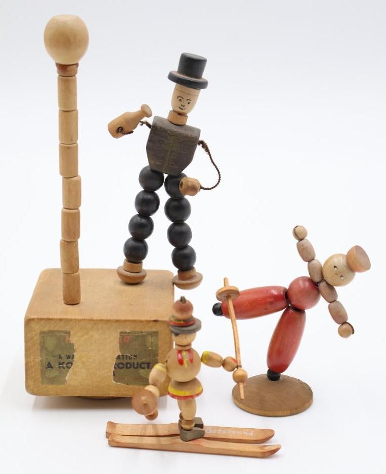 Three Vintage Wackelfigur Wood Jointed Bead Toys: German folk wooden bead toys, including vintage "Hangover Pete" Kohner push puppet toy from the 1940s or 1950s.
