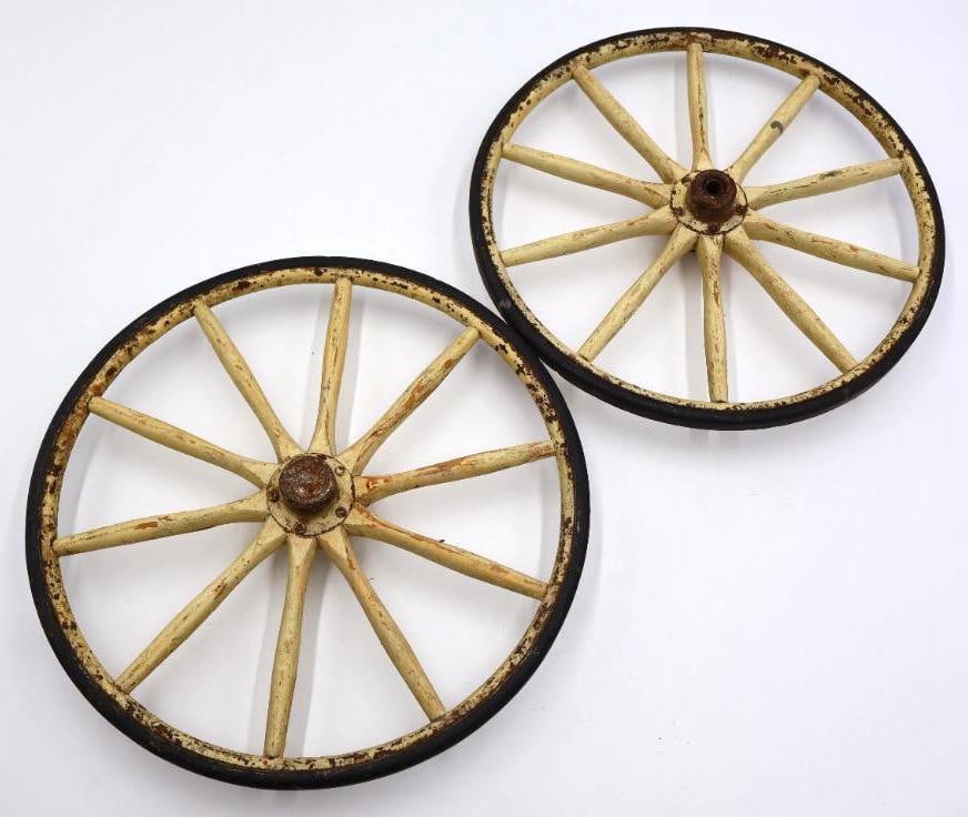 Vintage Wooden Wagon Wheels: Pair of wooden wagon style wheels with thin rubber tire, measuring about 14" across 