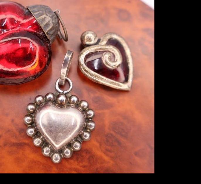 Three Heart Shaped Pendants, Including Sterling Silver: One heart marked Mexico 925