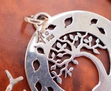 Three Sterling Silver Marked Pendants - 6