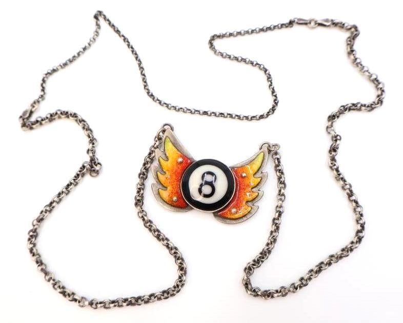 Sterling Silver and Mixed Media Eye Candy 'Flaming 8-Ball' Necklace: Marked Eye Candy .925, made by artist Chelsea Stone combines metal fabrication with found reclaimed objects. This necklace features an 8 ball piece and enamel flames, all on .925 marked pendant and
