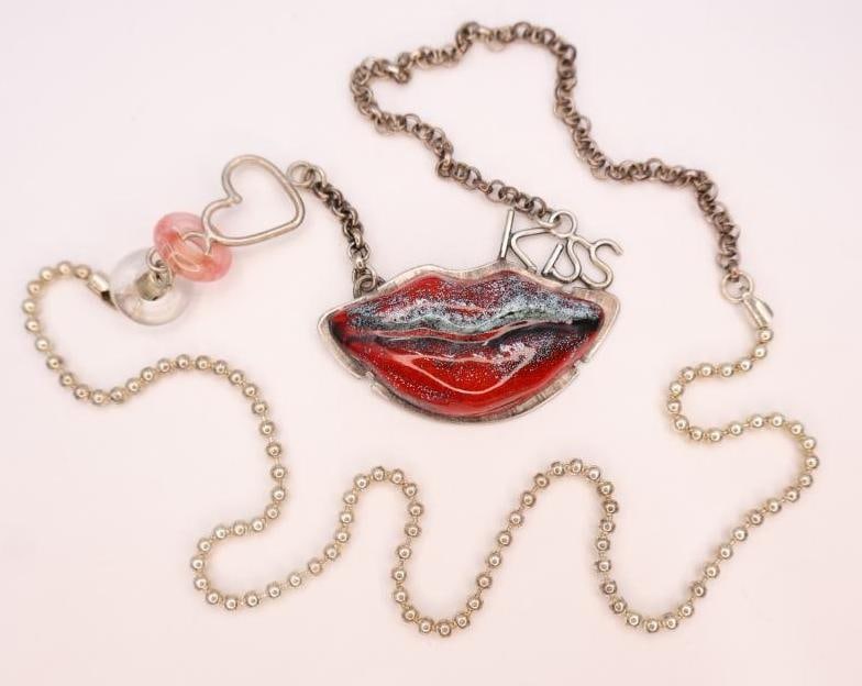 Sterling Silver 'Sweet' Artisan Mixed Media Necklace: Marked 'Sweet' .925, made by artist Chelsea Stone this piece features enamel glazed lips and the word 'kiss' set in sterling silver on long silver chain accented with glass beads