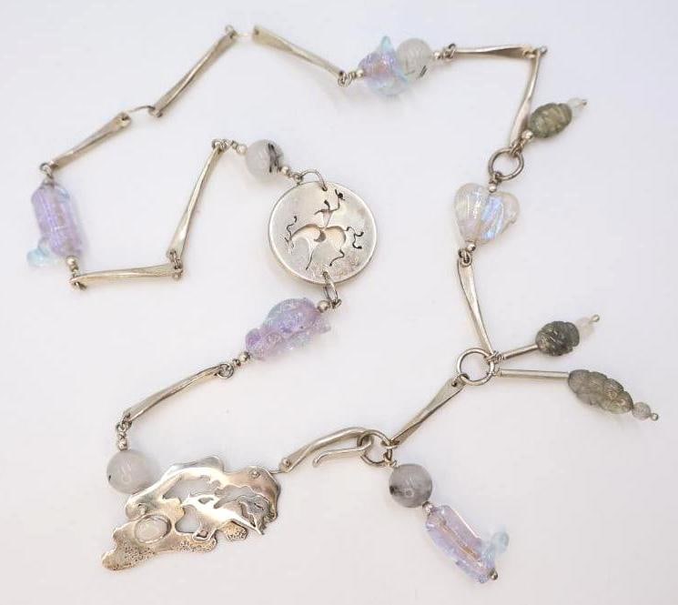 Lovely 'Ghost Riders' Silver and Beaded Necklace: Features western themed glass beads and stone beads, and large carved silver charms. Necklace is unmarked but nonmagnetic