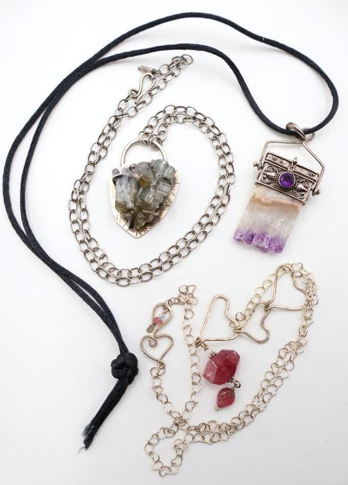 Three Natural Stone Necklaces including Sterling Silver: Tag states 'Sterling Silver pink tourmaline 'love stone' necklace, and large crystal pendant marked Albers on back