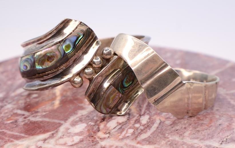 Vintage Jewelry Bracelet Assortment: Collection of vintage bracelets including chain, cuff, and decorative link styles with mixed metal finishes.