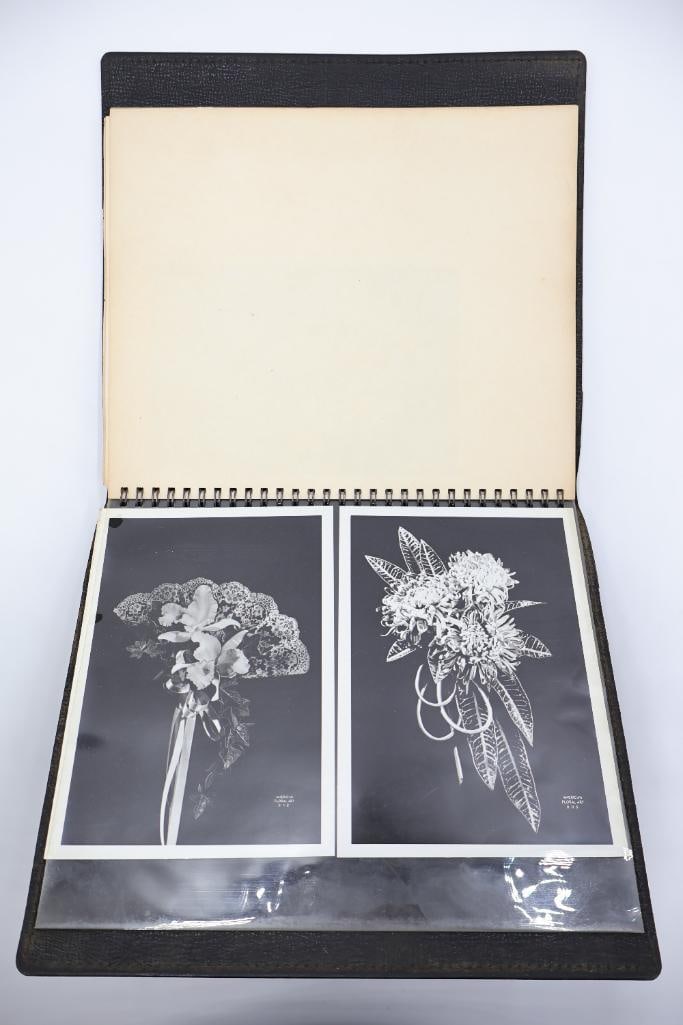 American Floral Art School Photograph Album: Vintage American Floral Art School presentation album featuring black and white floral arrangement and wedding bouquet photographs from Chicago, Illinois. Includes protective sleeves and floral
