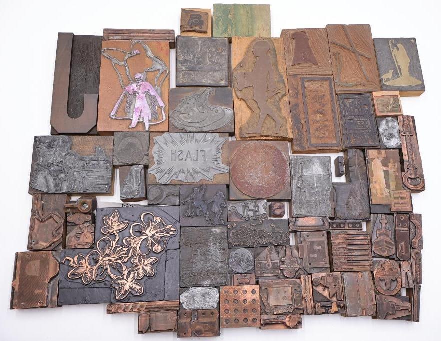 Large Assortment of Vintage Printing Blocks, Copper Plates & Industrial Dies: Large mixed collection of vintage printing blocks, copper engraving plates, industrial dies, and letterpress components featuring floral motifs, figurative imagery, machinery parts, typography, and