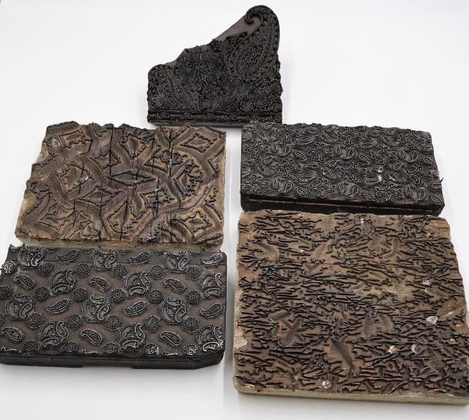 Group of Antique Ornamental Printing Plates & Textured Engraving Blocks: Small collection of antique ornamental printing plates and textured engraving blocks featuring intricate decorative patterns, floral motifs, and dense etched surface designs. Includes metal plates mou