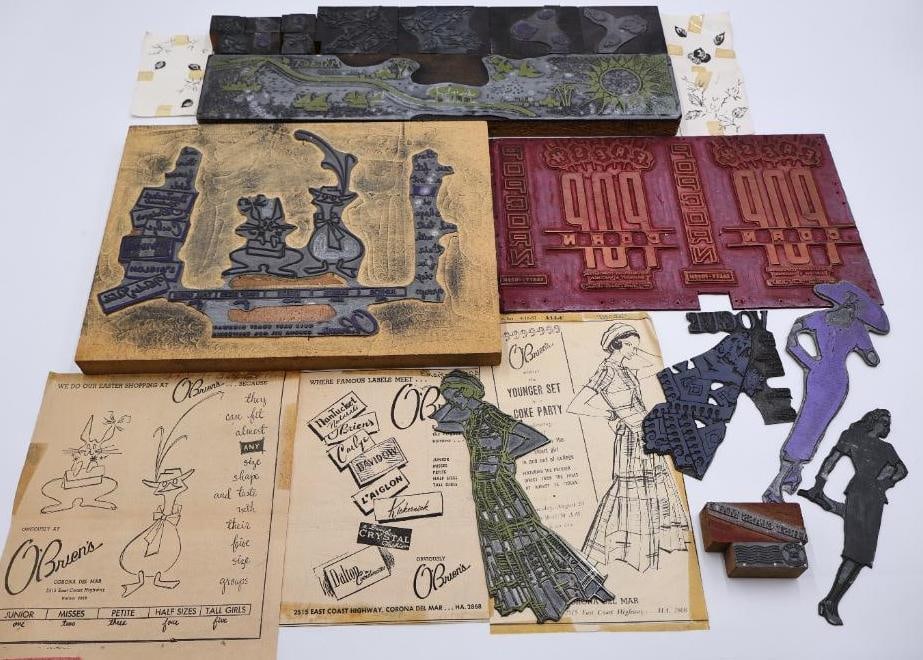 Vintage Fashion Advertising Printing Plates & Illustrative Letterpress Blocks: Interesting collection of vintage fashion advertising printing plates, engraved letterpress blocks, and commercial illustration cuts featuring stylized figures, apparel advertisements, decorative grap