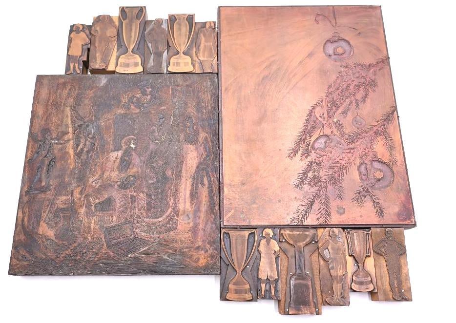 Antique copper etching plates and wooden printer's blocks used for traditional printing (1 of 18)