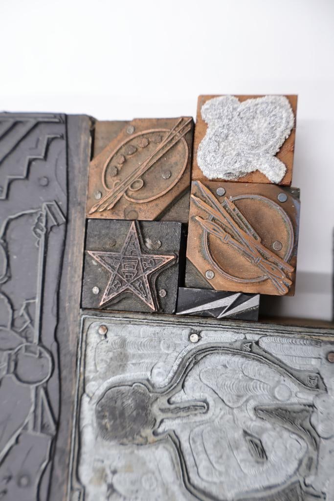 Collection of vintage letterpress printer's blocks made from wood and etched metal - 10