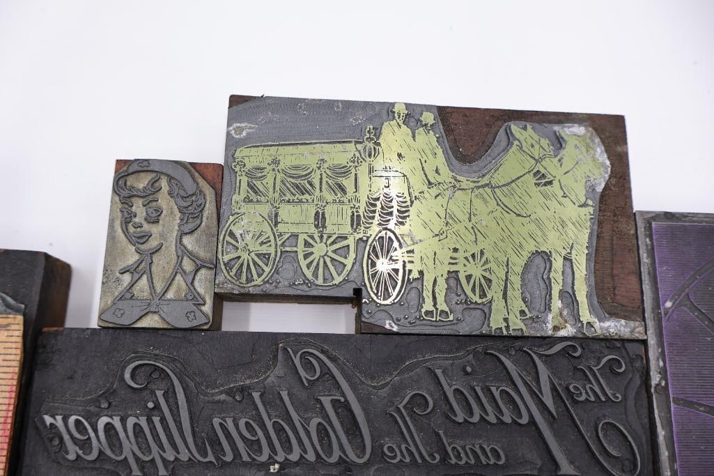 Collection of vintage letterpress printer's blocks made from wood and etched metal - 16