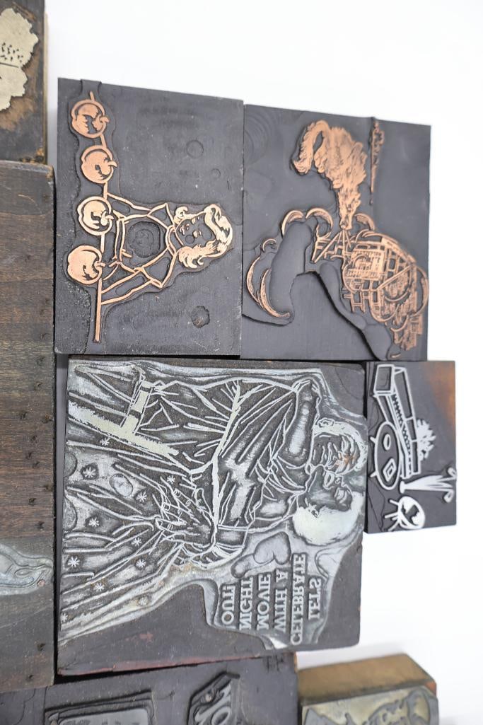Collection of vintage letterpress printer's blocks made from wood and etched metal - 17