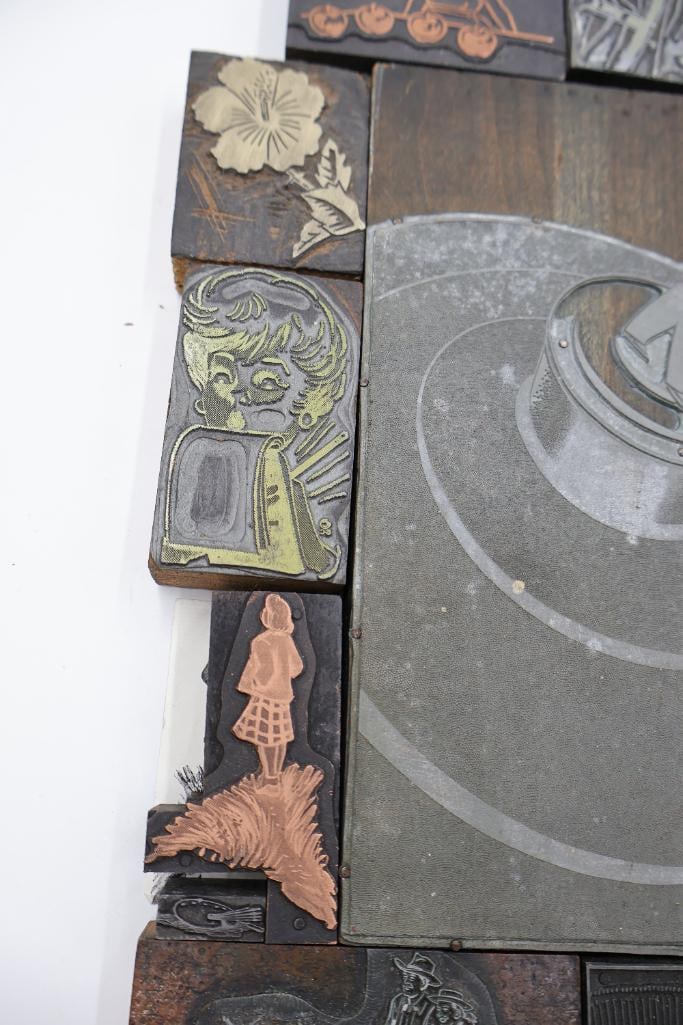 Collection of vintage letterpress printer's blocks made from wood and etched metal - 19